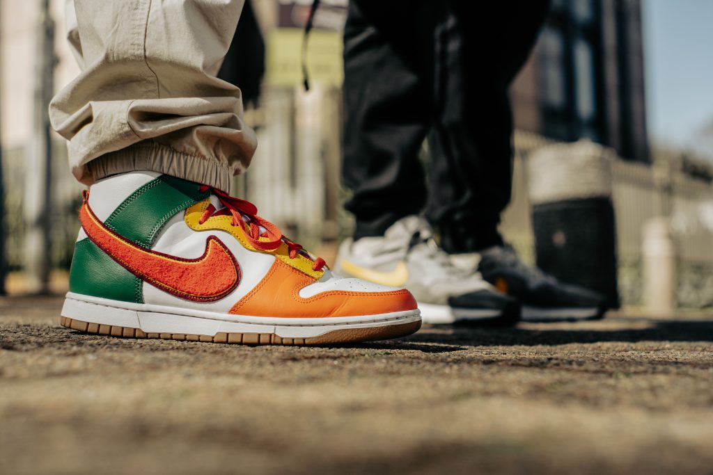 Vibrant Nike sneakers spotted in a stylish urban setting in Johannesburg.