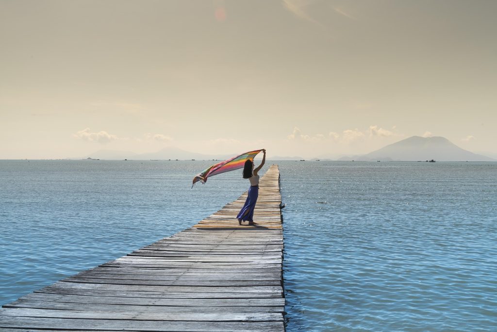 women, jetty, sea, shawl, pier, sky, ocean, nature, outdoors